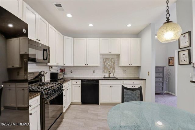 215 Bloomsbury Drive, Morganville, NJ 07751
