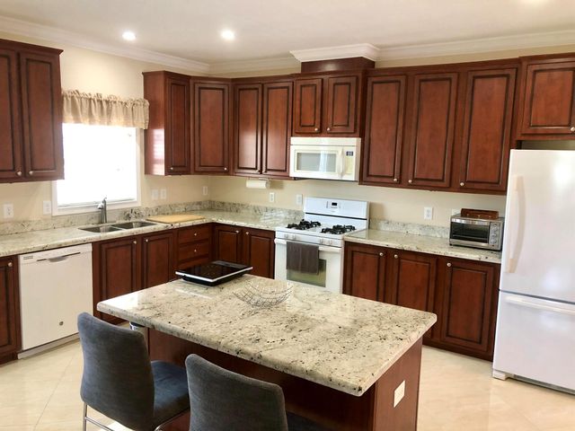 1215 Poinsettia Drive, Deerfield Beach, FL 33442