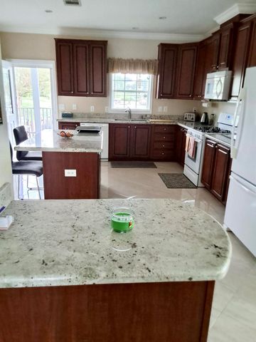 1215 Poinsettia Drive, Deerfield Beach, FL 33442