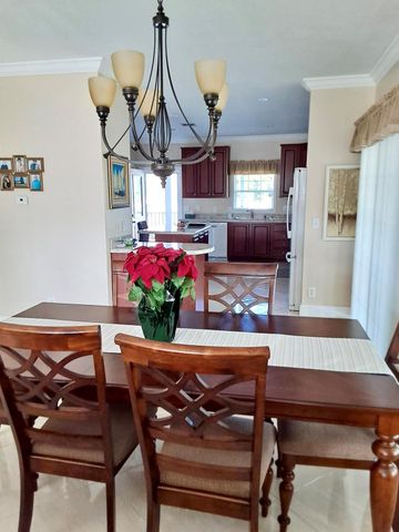 1215 Poinsettia Drive, Deerfield Beach, FL 33442