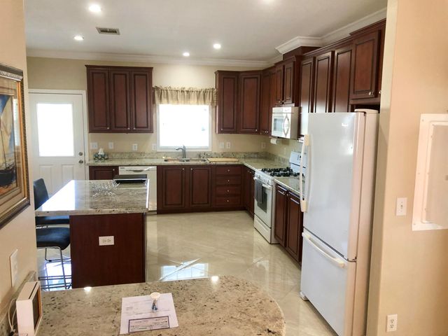 1215 Poinsettia Drive, Deerfield Beach, FL 33442