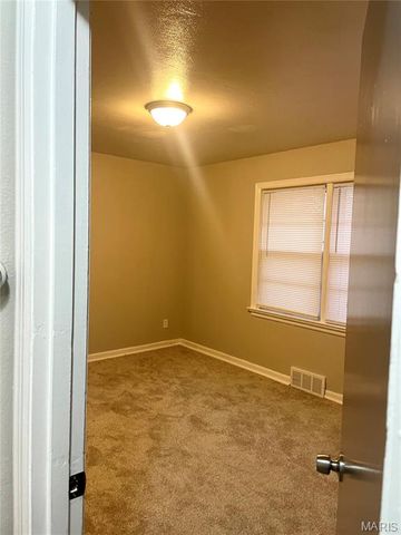 9418 PATTONWOOD DRIVE, Jennings, MO 63136