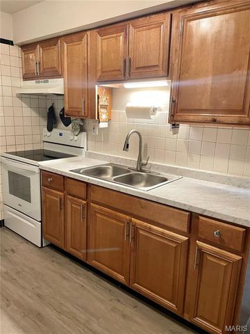 9418 PATTONWOOD DRIVE, Jennings, MO 63136