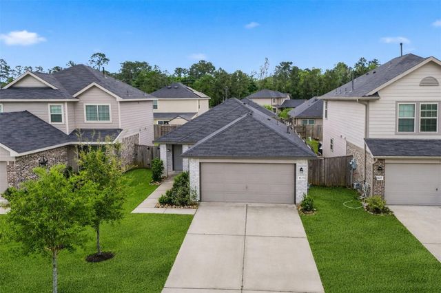 1223 Blue Hazel Court, Pinehurst, TX 77362