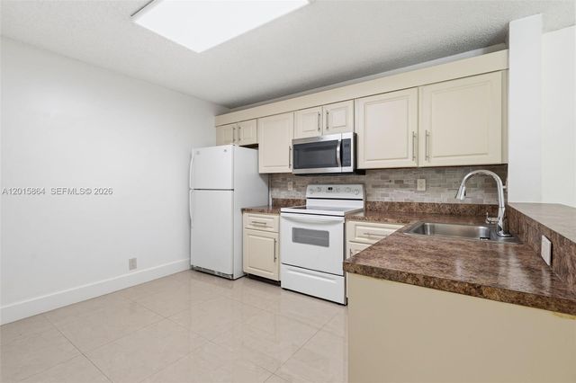 10131 W Sunrise Blvd 204, Plantation, FL 33322