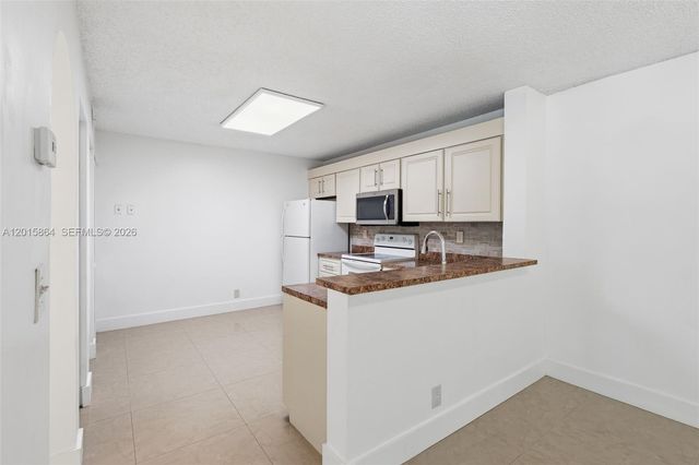 10131 W Sunrise Blvd 204, Plantation, FL 33322