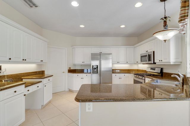 411 Eagleton Cove Way, Palm Beach Gardens, FL 33418