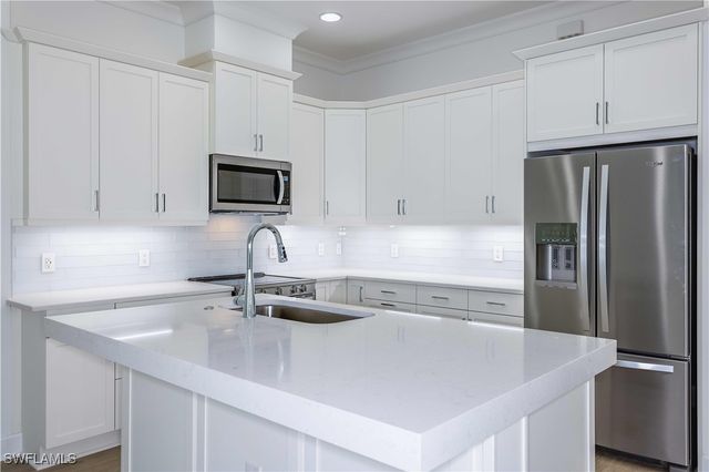 9032 Calypso CT, Naples, FL 34112