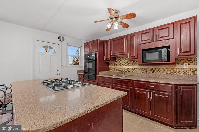 1908 E BELVEDERE AVE, Baltimore, MD 21239