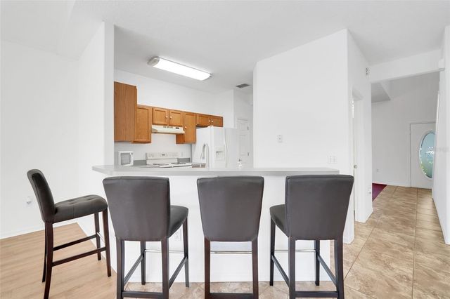 1033 WOODFLOWER WAY, Clermont, FL 34714