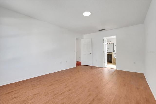 1033 WOODFLOWER WAY, Clermont, FL 34714