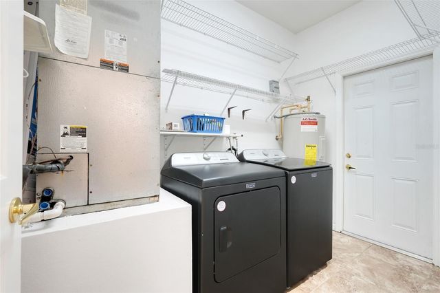 1033 WOODFLOWER WAY, Clermont, FL 34714