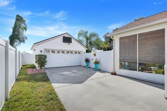 1033 WOODFLOWER WAY, Clermont, FL 34714