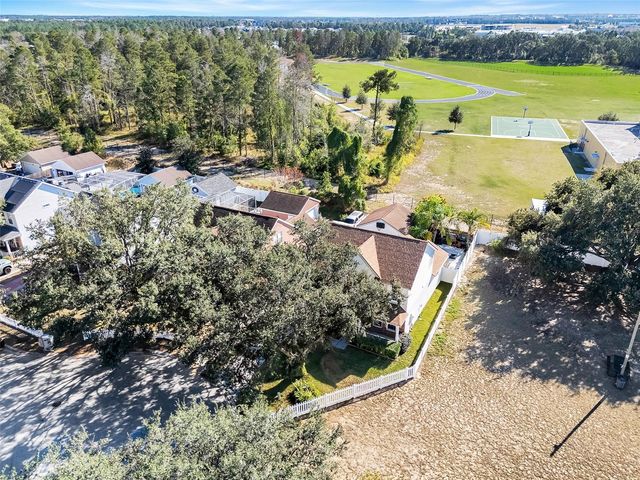 1033 WOODFLOWER WAY, Clermont, FL 34714