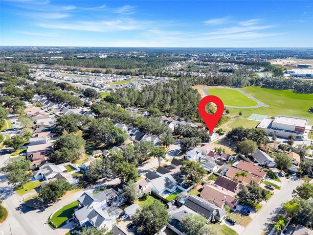 1033 WOODFLOWER WAY, Clermont, FL 34714