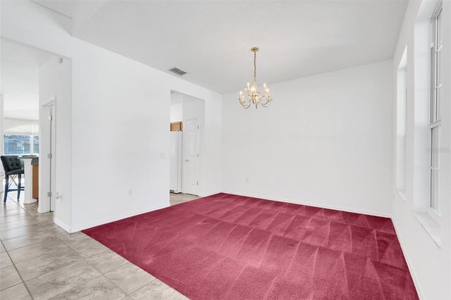 1033 WOODFLOWER WAY, Clermont, FL 34714