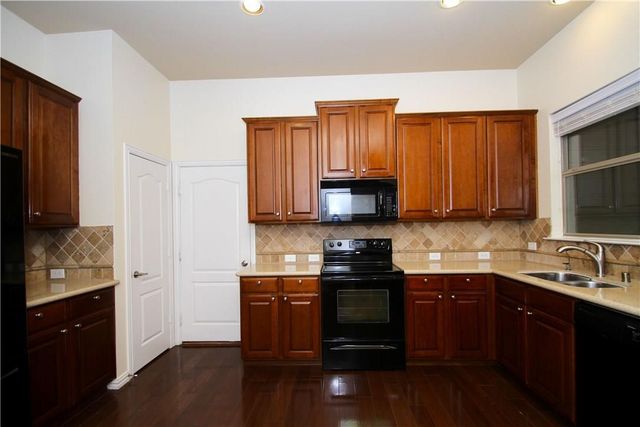 4233 Swan Forest Drive E, Carrollton, TX 75010