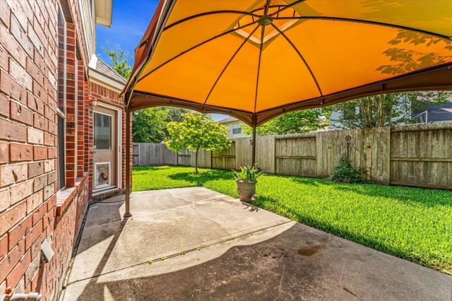 21861 Maidens Crossing Drive, Kingwood, TX 77339