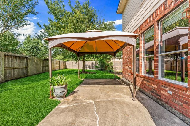 21861 Maidens Crossing Drive, Kingwood, TX 77339