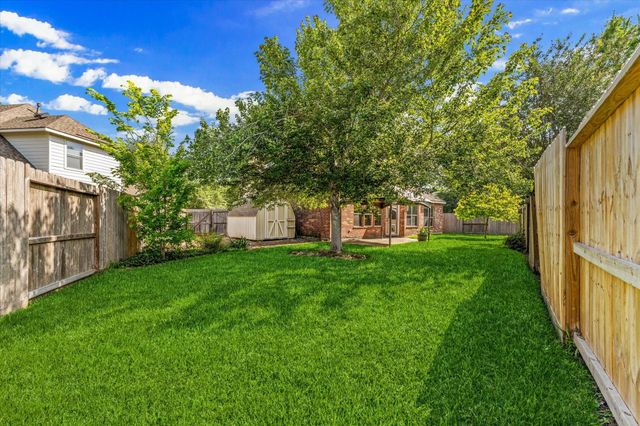 21861 Maidens Crossing Drive, Kingwood, TX 77339