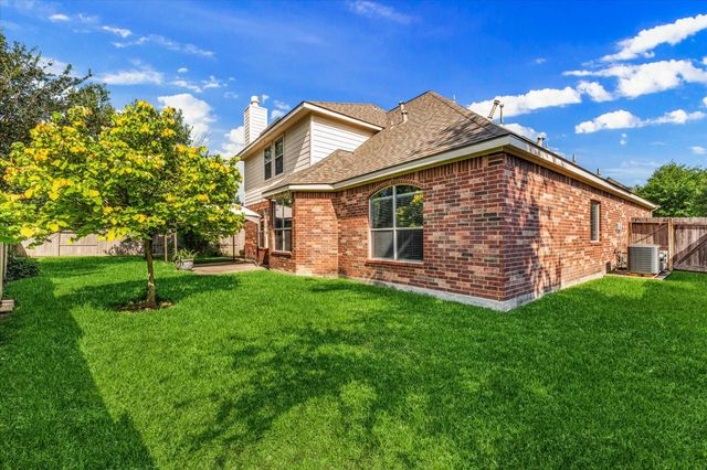21861 Maidens Crossing Drive, Kingwood, TX 77339