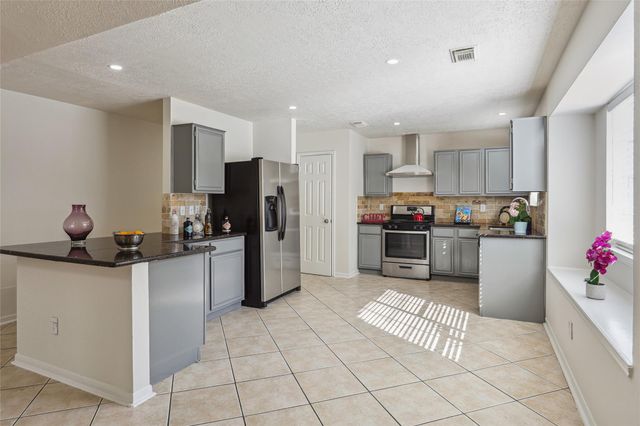 9423 Rippling Fields Drive, Houston, TX 77064