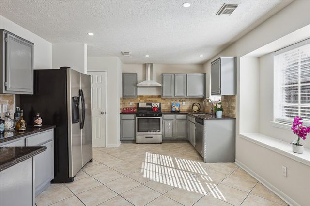 9423 Rippling Fields Drive, Houston, TX 77064