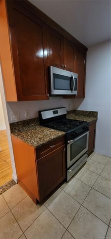 99-13 62nd Drive, Rego Park, NY 11374