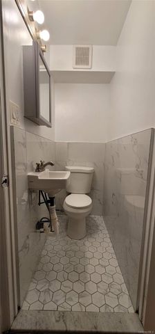99-13 62nd Drive, Rego Park, NY 11374