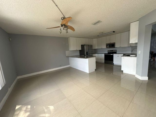 7700 Stone Harbour Drive 4, Lake Worth, FL 33467