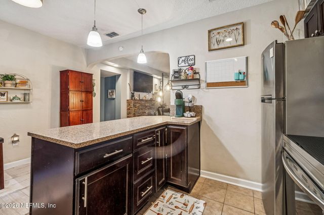 4665 TIMUQUANA Road, Jacksonville, FL 32210