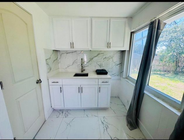 5678 Silvian Road, West Palm Beach, FL 33415