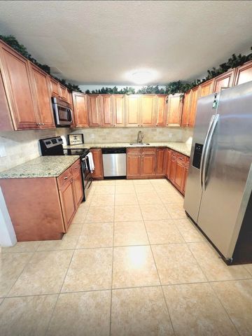 5678 Silvian Road, West Palm Beach, FL 33415