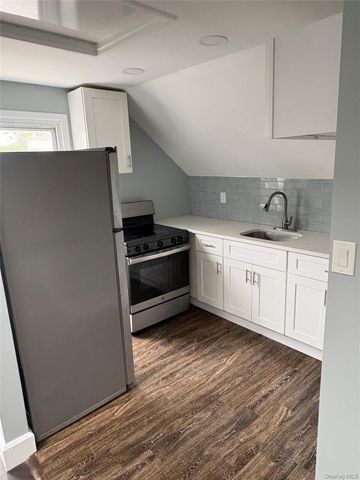 100 Merrick Road, Amityville, NY 11701