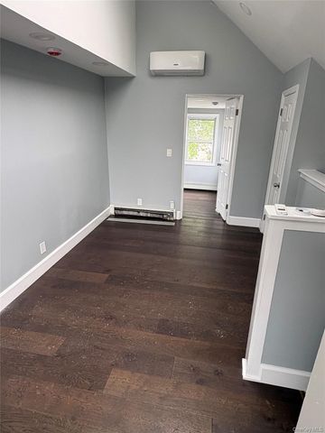 100 Merrick Road, Amityville, NY 11701