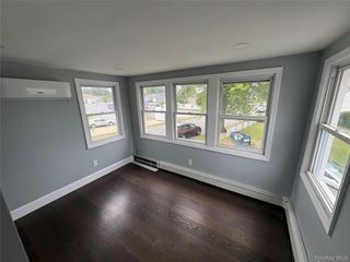100 Merrick Road, Amityville, NY 11701