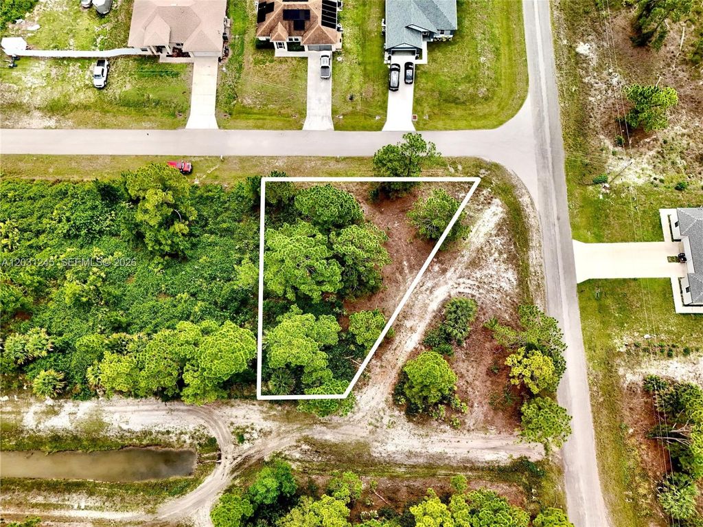 721 PINECASTLE DR, Lehigh Acres, FL 33974