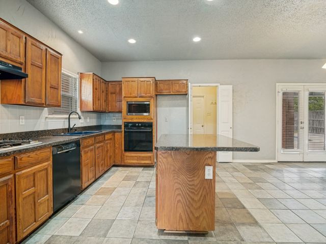9102 Barton Creek Drive, Rowlett, TX 75089