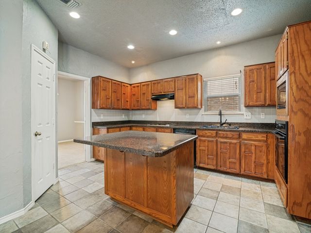 9102 Barton Creek Drive, Rowlett, TX 75089