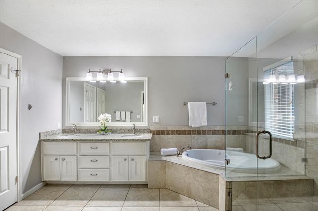 98 S Village Knoll Circle, The Woodlands, TX 77381