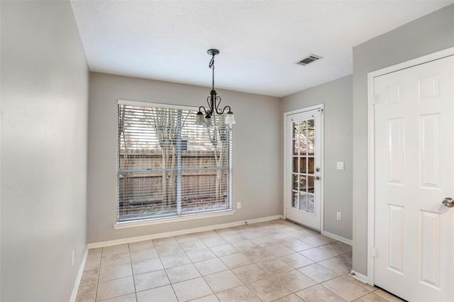 98 S Village Knoll Circle, The Woodlands, TX 77381