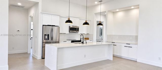 1032 NW 33rd Place, Cape Coral, FL 33993