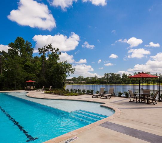 1409 Northwood Bluff Lane, Pinehurst, TX 77362