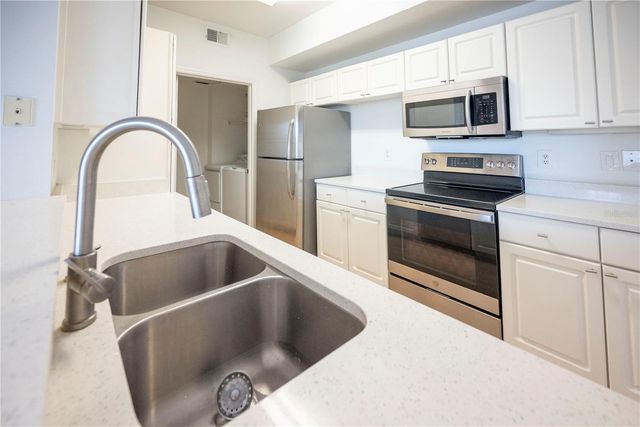 5554 METROWEST BOULEVARD 4-211, Orlando, FL 32811