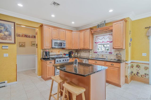 9 Tuthill Creek Drive, Blue Point, NY 11772