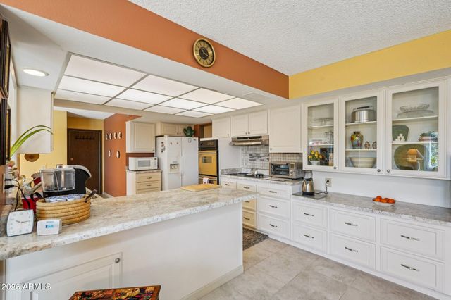 9843 W WRANGLER Drive, Sun City, AZ 85373