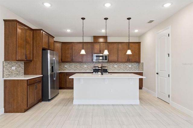 5064 MEADOW SONG DRIVE, Leesburg, FL 34748