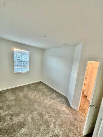 7477 STONE CREEK TRAIL, Kissimmee, FL 34747