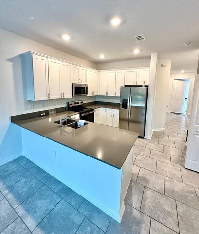 7477 STONE CREEK TRAIL, Kissimmee, FL 34747