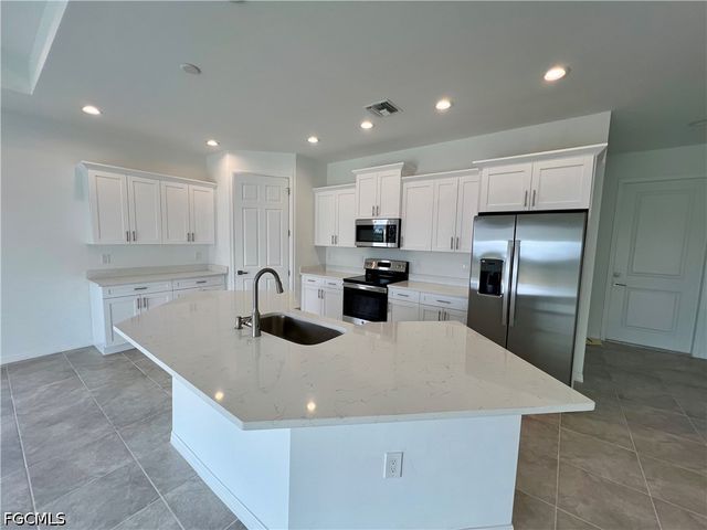 628 Falls LN, Lehigh Acres, FL 33974